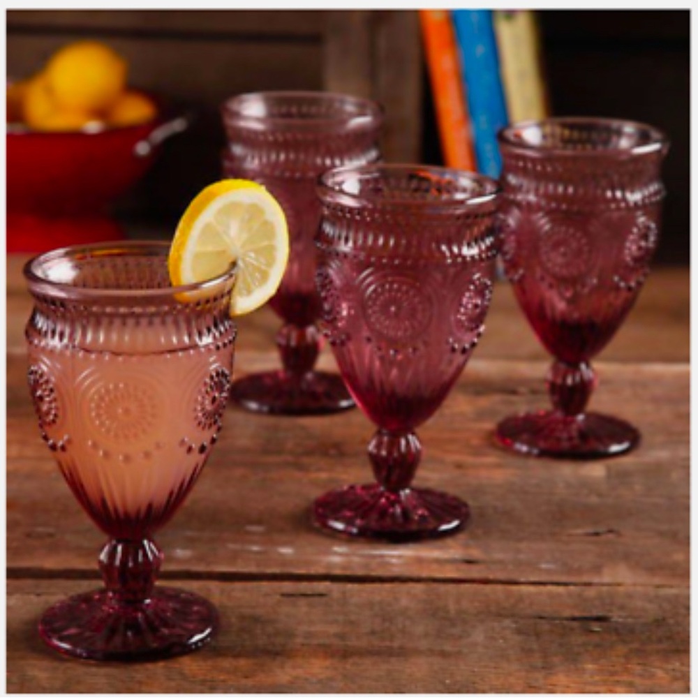 New unopened Plum 12 oz. vintage style footed glasses. 4 per box.